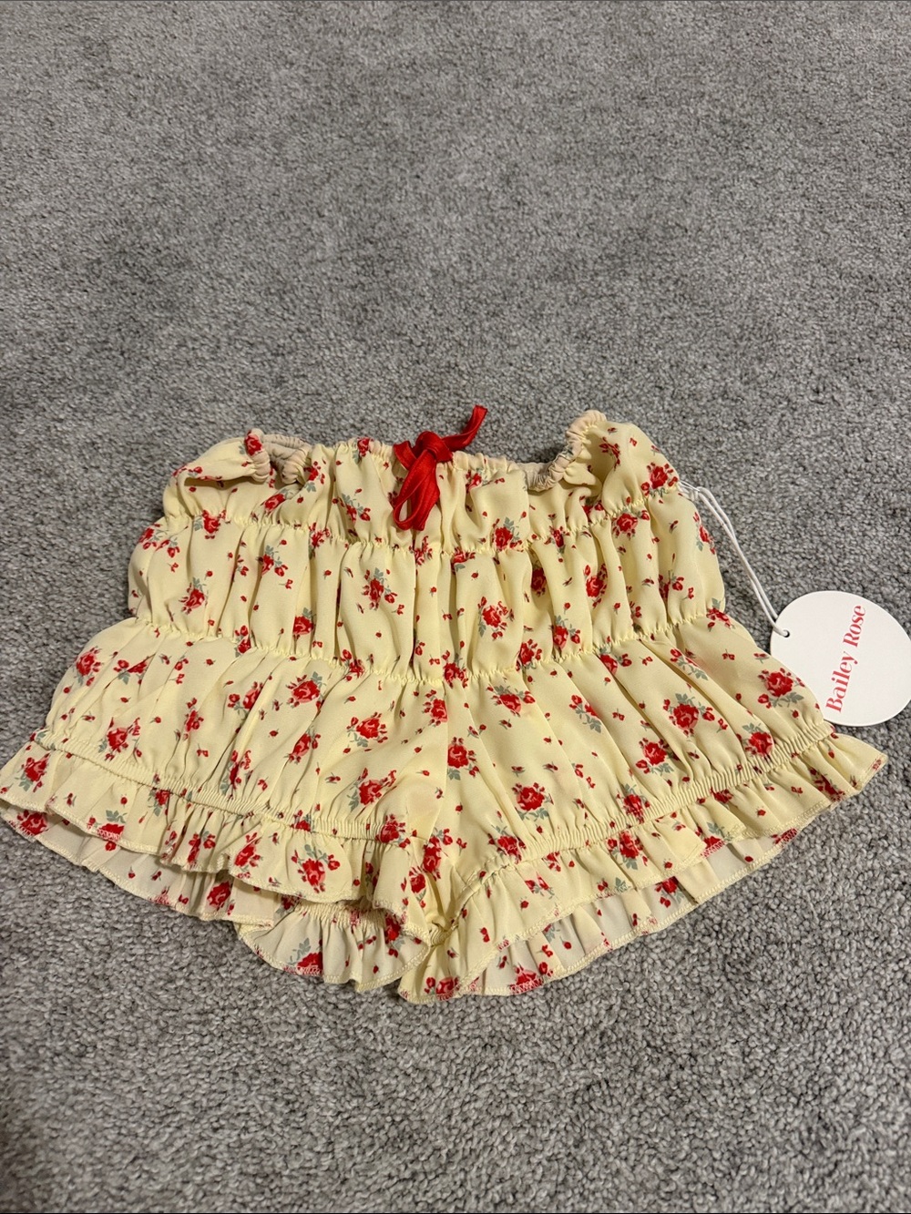 Ruffled Yellow Floral Smocked mini Shorts with Red Trim